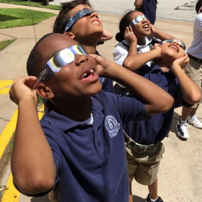 children viewing eclipse